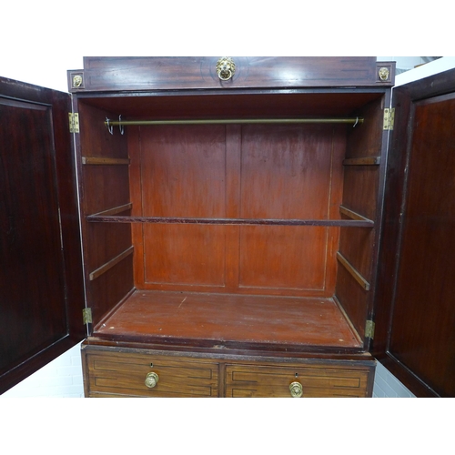 282 - Georgian mahogany linen press, stepped pediment above a pair of flame veneered doors, internal brass... 