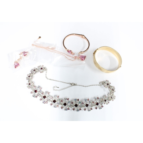 29 - Gold plated stiff hinged bangle and a collection of costume jewellery (a lot)