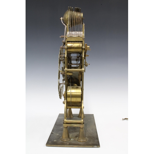 315 - Brass skeleton clock, triple fusee (three train) striking on eight bells, 44cm