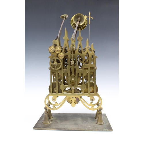 315 - Brass skeleton clock, triple fusee (three train) striking on eight bells, 44cm