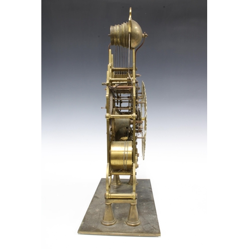 315 - Brass skeleton clock, triple fusee (three train) striking on eight bells, 44cm