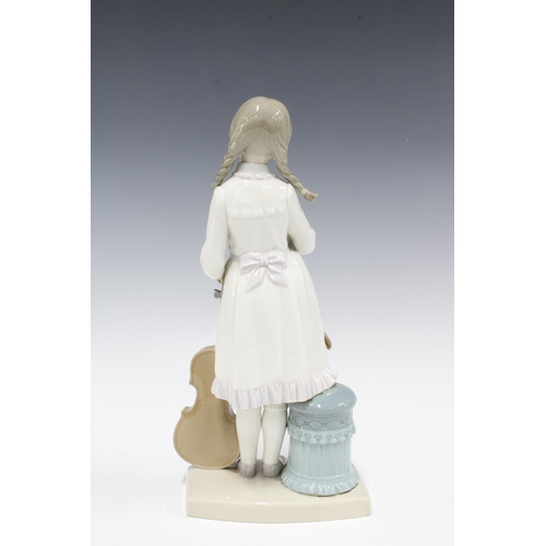 319 - Lladro figure of a violinist, with repair to bow, 30cm