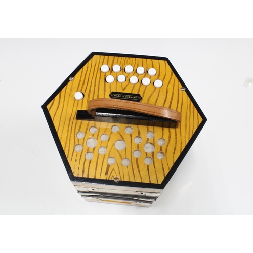 335 - German concertina, 18 x 18cm