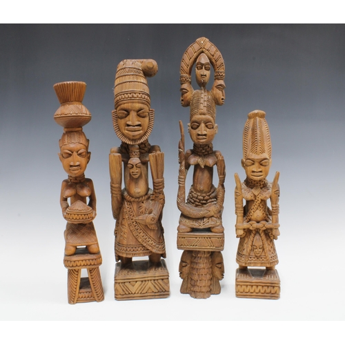 379 - Four Nigerian carved wood figures, three signed Gani Fakeye and the other A. Fakeye, tallest 51cm (4... 