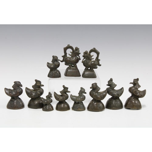 411 - Collection of small bronze birds, largest 7cm, together with a pair of bronze animals (11)