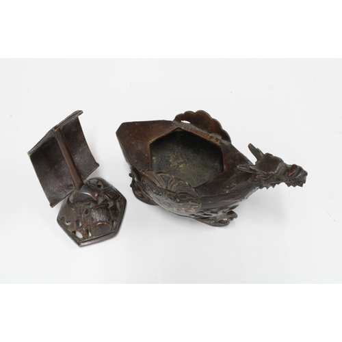 432 - Bronze and enamel dragon ship censor, the detachable cover modelled as a sail, 16cm high