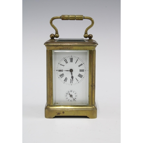 435 - Miniature brass and glass cased  alarm carriage clock, with key 9.5cm including handle