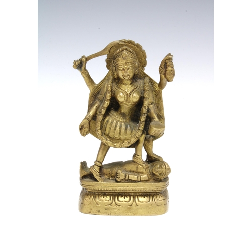 440 - Ormolu bronze figure of an Indian Deity, on lotus base, 15cm