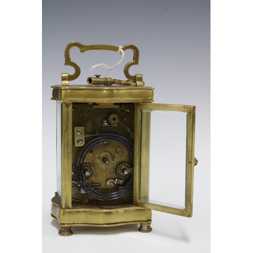 441 - Brass and glass panelled repeating carriage clock, with key, 15cm including handle