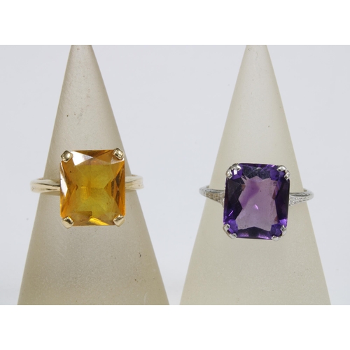 55 - 9ct gold smoky quartz ring, 14ct gold citrine ring and a white metal gemset dress ring with indistin... 