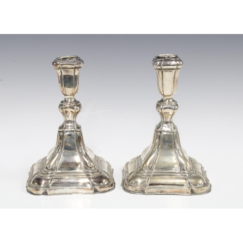 65 - A pair of German silver candlesticks, stamped 835, 18cm high (2)