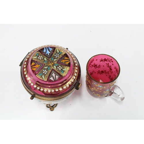 87 - Bohemian enamelled cranberry glass trinket pot with lid and gilt metal fittings, 8cm, together with ... 
