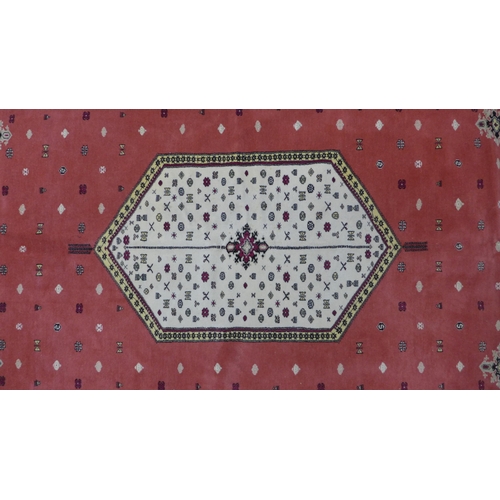 260 - 20th century Moroccan carpet / large rug, rose field with an hexagonal medallion in ivory, multiple ... 