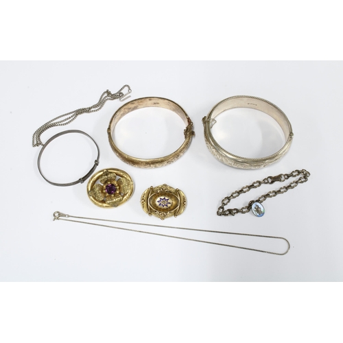 16 - Three silver bangles, two Victorian yellow metal brooches, white metal chains and bracelet, etc (a l... 