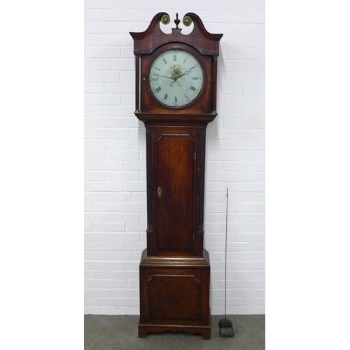 265 - An oak grandfather clock with walnut veneers , broken swan neck pediment over a painted dial with a ... 