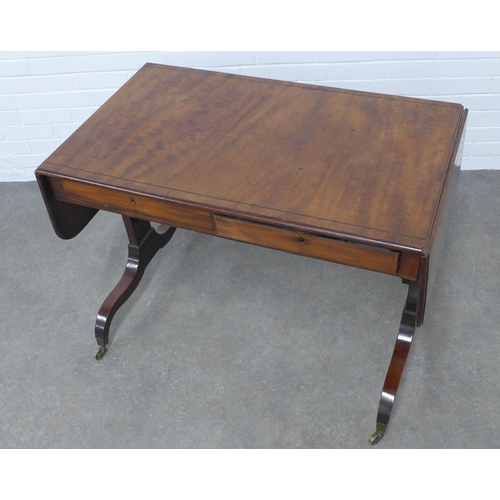 274 - Mahogany sofa table of typical design, 103 x 71 x 65cm.