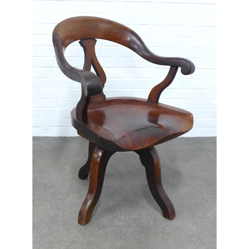 277 - Mahogany desk chair, scrolling top rail and arms, pierced splat and solid seat, revolving base, 66 x... 