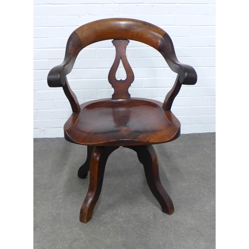 277 - Mahogany desk chair, scrolling top rail and arms, pierced splat and solid seat, revolving base, 66 x... 