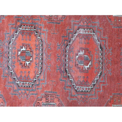 279 - Eastern rug, red field with three guls,  120 x 90cm.