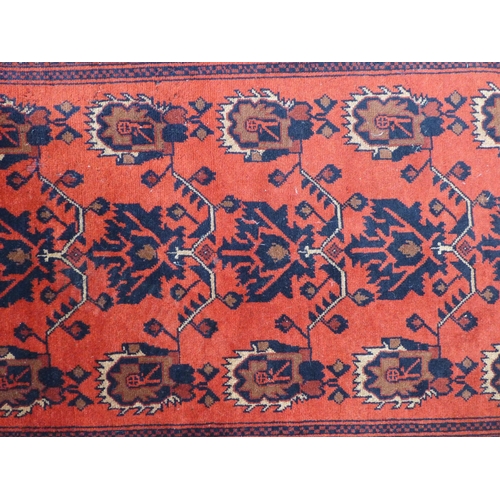 280 - Eastern rug, red field with serrated foliate pattern, 155 x 102cm.