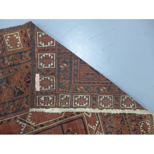 281 - Eastern rug, worn red field with geometric motifs, 262 x 172cm.