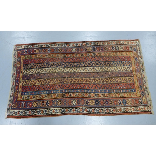 282 - Eastern rug, with striped field 220 x 114cm.