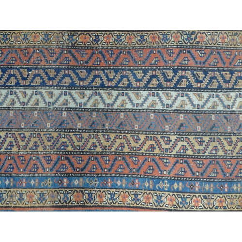 282 - Eastern rug, with striped field 220 x 114cm.