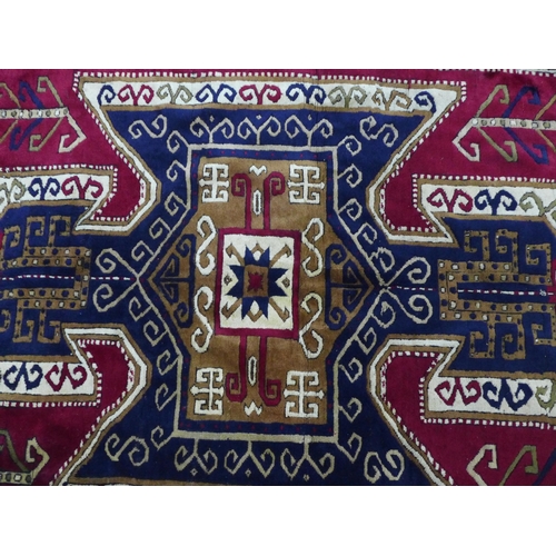 289 - Caucasian rug, blue and red field, 200 x 148cm.