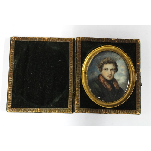 296 - Portrait miniature of a Gent, possibly of German descent, with fitted case, 8 x cm including gilt me... 