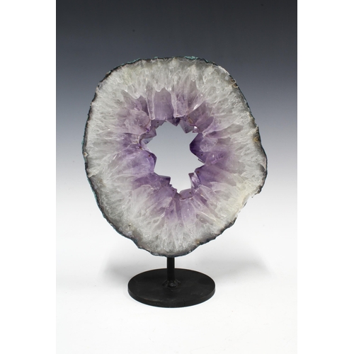 308 - Amethyst Geode slice, on metal display stand, geode is 22 x 24cm