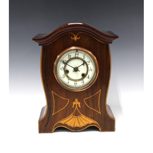 317 - Mahogany and satinwood inlaid mantle clock, arched top over a dial with enamel chapter ring with Ara... 