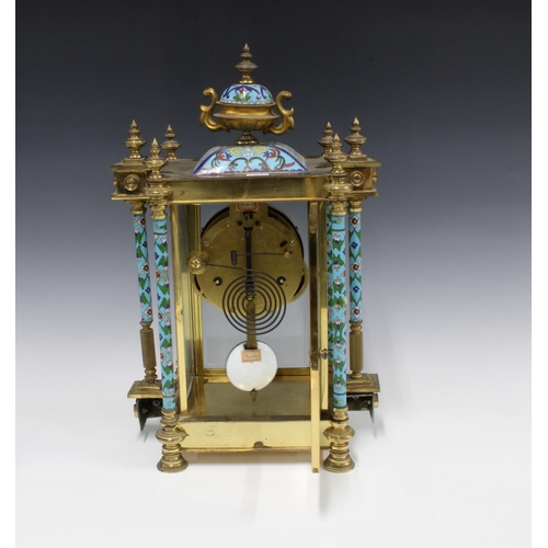 318 - Cloisonne, brass and glass cased mantle clock, surmounted by an urn finial, enamel dial with roman n... 