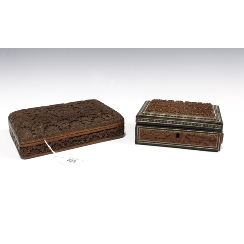 323 - Two Eastern hardwood carved boxes, one with flowers the other with birds, larger 20 x 13cm (2)