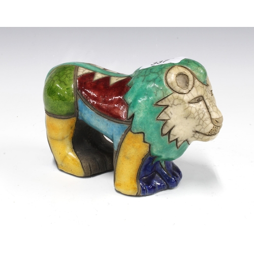 337 - Art pottery lion in multi coloured crackle glaze, 19cm long