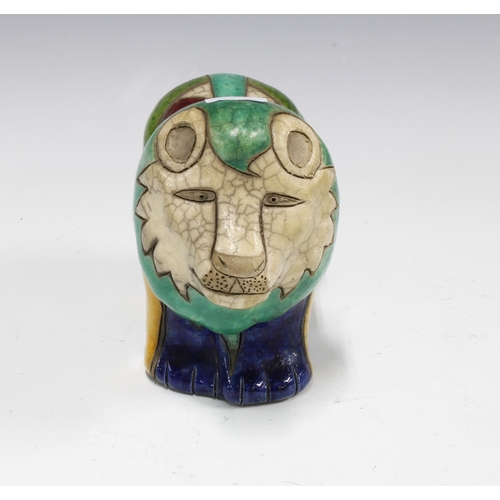 337 - Art pottery lion in multi coloured crackle glaze, 19cm long