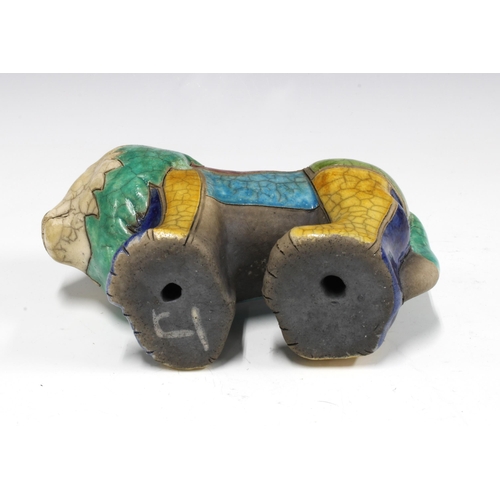 337 - Art pottery lion in multi coloured crackle glaze, 19cm long