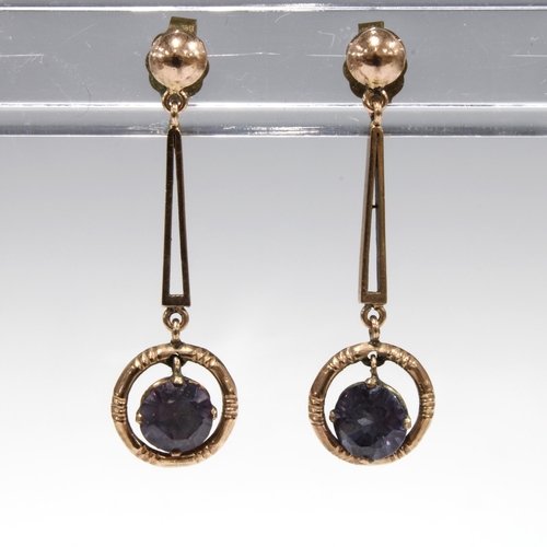 36 - A pair of unmarked yellow metal gemset drop earrings (2)
