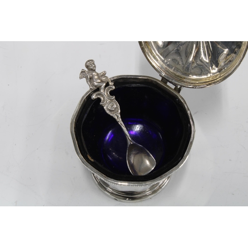 53 - Birmingham silver mustard pot with a blue glass liner and continental silver salt spoon together wit... 