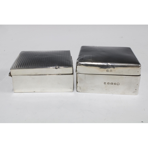 58 - Two silver cigarette boxes, one with 1922 inscription and the other with Birmingham 1934 hallmarks, ... 
