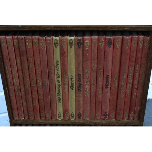 346 - Set of Shakespeare novels contained on a small oak bookcase, 50cm high approx