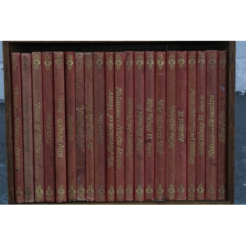 346 - Set of Shakespeare novels contained on a small oak bookcase, 50cm high approx