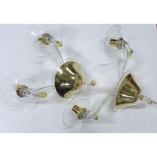 348 - A pair of contemporary glass twin arm wall lights with brass mounts and Murano type coloured glass d... 