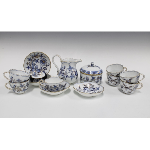 101 - Meissen Blue Onion part teaset to include six cups, four saucers, sugar bowl and cream jug (jug rest... 