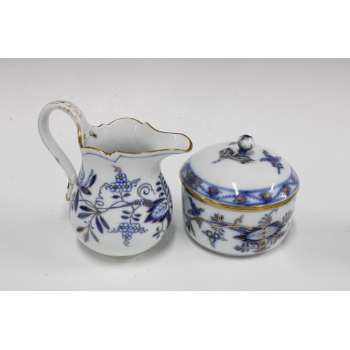 101 - Meissen Blue Onion part teaset to include six cups, four saucers, sugar bowl and cream jug (jug rest... 