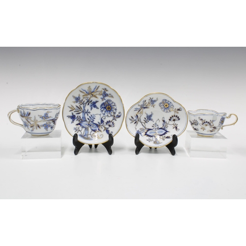 101 - Meissen Blue Onion part teaset to include six cups, four saucers, sugar bowl and cream jug (jug rest... 