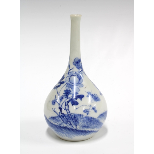 111 - Chinese blue and white bottle neck vase decorated with flowers, 16cm high.