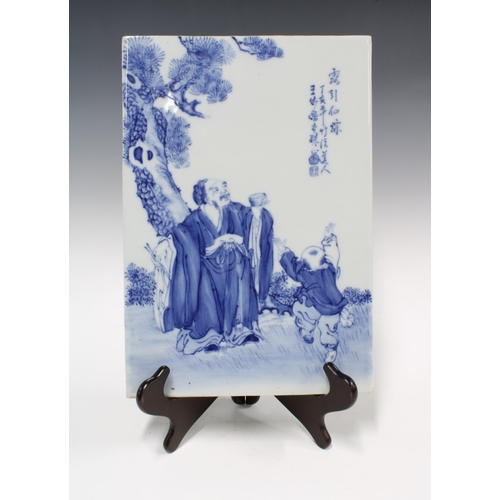 148 - 20th century Chinese blue and white porcelain plaque, rectangular form, painted with an edler and a ... 