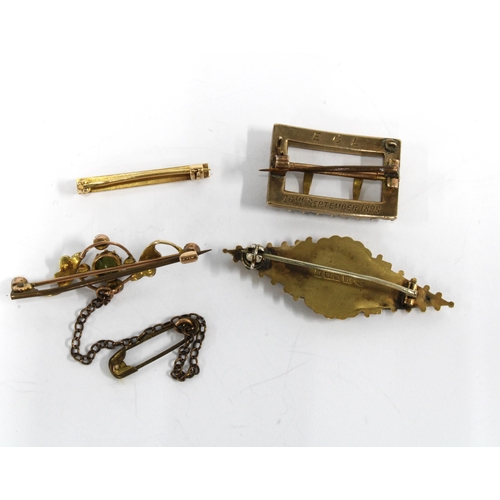 19 - An antique yellow metal and seed pearl buckle brooch with inscribed date verso September 1898 togeth... 