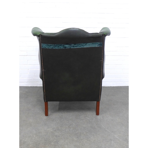 202 - Green button back wing armchair, 92 x 104 x 57cm. (upholstery a/f)