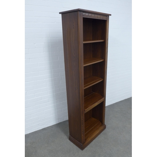 237 - An Ercol elm open bookcase, 65 x 197 x 34cm.